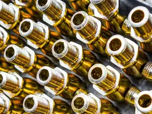 Rows of threaded brass fittings