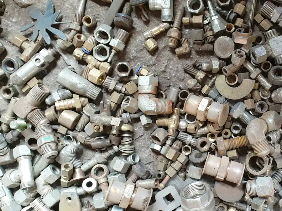 Pile of galvanised pipe fittings